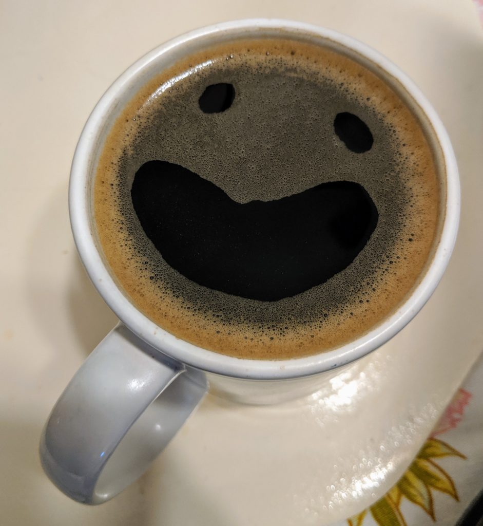 Smiling cup of coffee