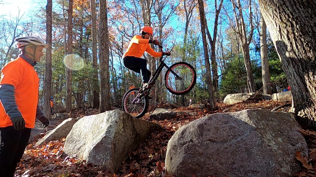 Preparing to drop gap from one rock to another on my trials bike